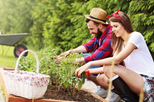 Gardener preparing a service agreement for a garden maintenance booking