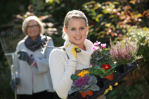 Gardener checking work quality as part of a complaints resolution